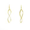 Handmade brass earrings in an elegant twisted shape, gold-plated and finished with a stainless steel hook for secure and hypoallergenic wear. Perfect for both everyday and evening outfits with a lightweight feel.