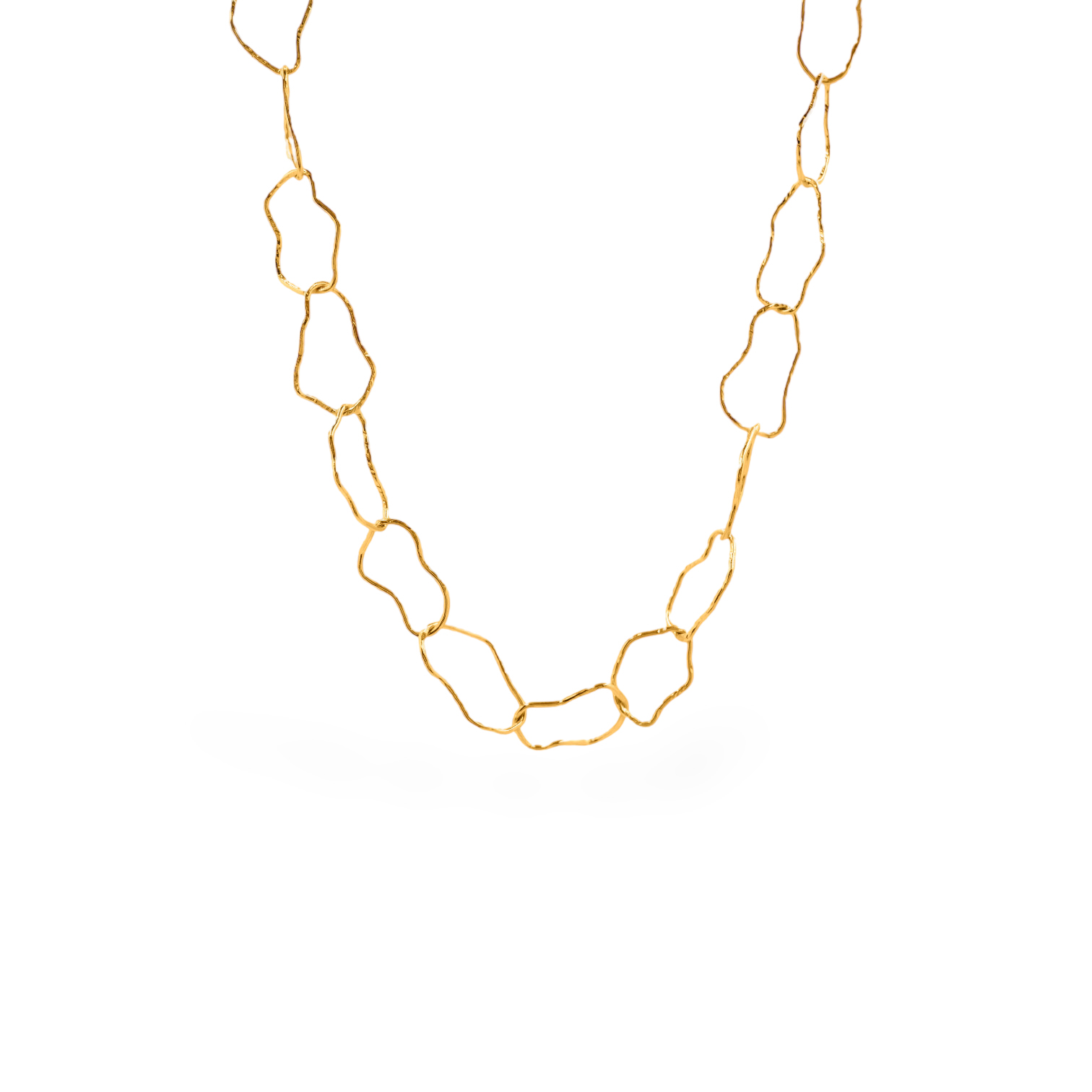 Μακρύ χειροποίητο κολιέ από ορείχαλκο με ακανόνιστα στοιχεία, επιχρύσωση (free nickel) και μαύρη οξείδωση. Ιδιαίτερο και ανάλαφρο, ιδανικό για εμφανίσεις με χαρακτήρα.